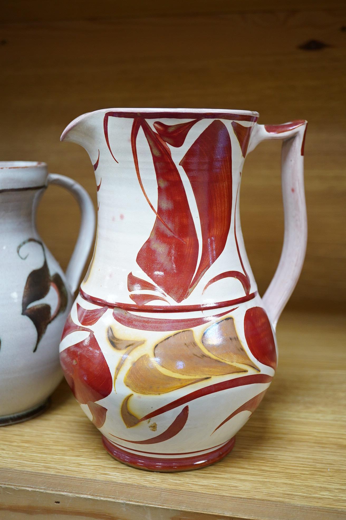 Alan Caiger-Smith (1930-2020), an Aldermaston Pottery lustre glazed jug and another, tallest 22cm. Condition - good
